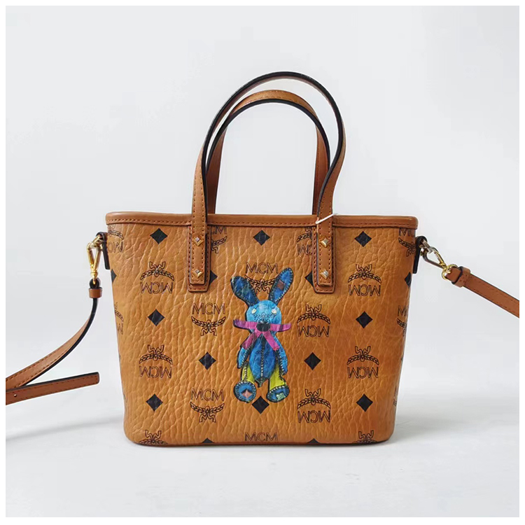 99新 MCM  安洁利严选手提斜挎包/BK0110945
