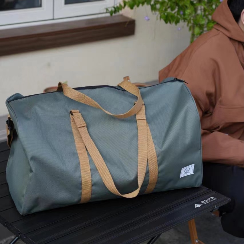 GEOPACK手提旅行包男女同款运动健身侧面鞋袋防水斜挎妈咪包