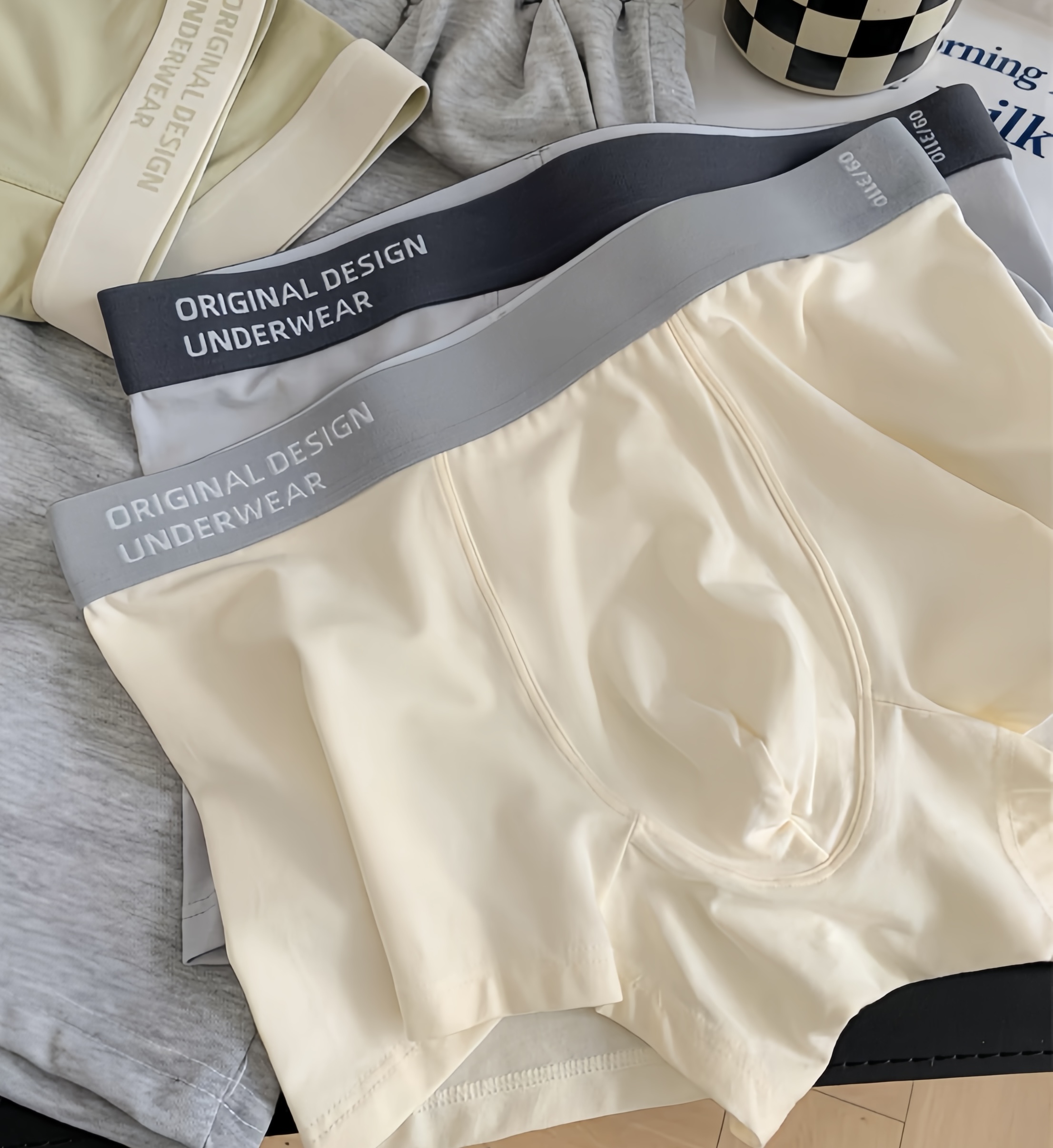 男生内裤宽松透气牛奶丝内裤男士薄款四角平角裤学生裤头男款