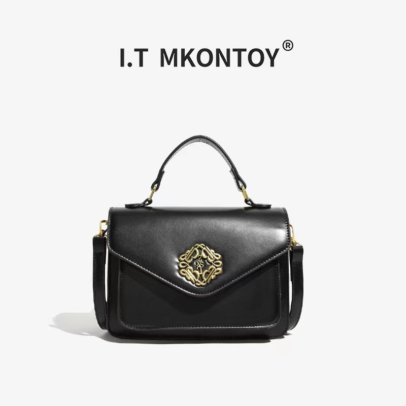 秋冬新款高端复古邮差包潮流百搭单肩黑色斜挎包1033