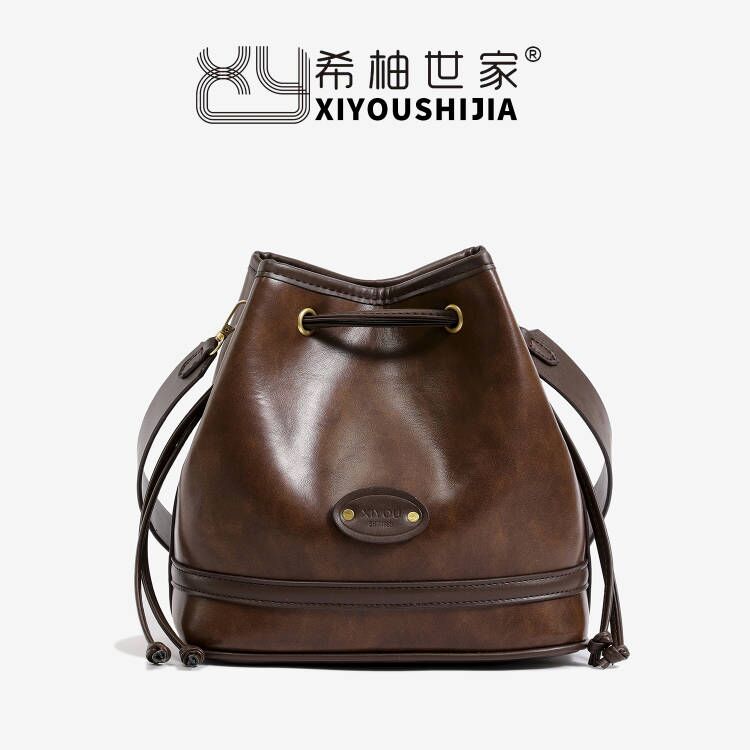 斜挎包女包时尚休闲百搭抽绳水桶包