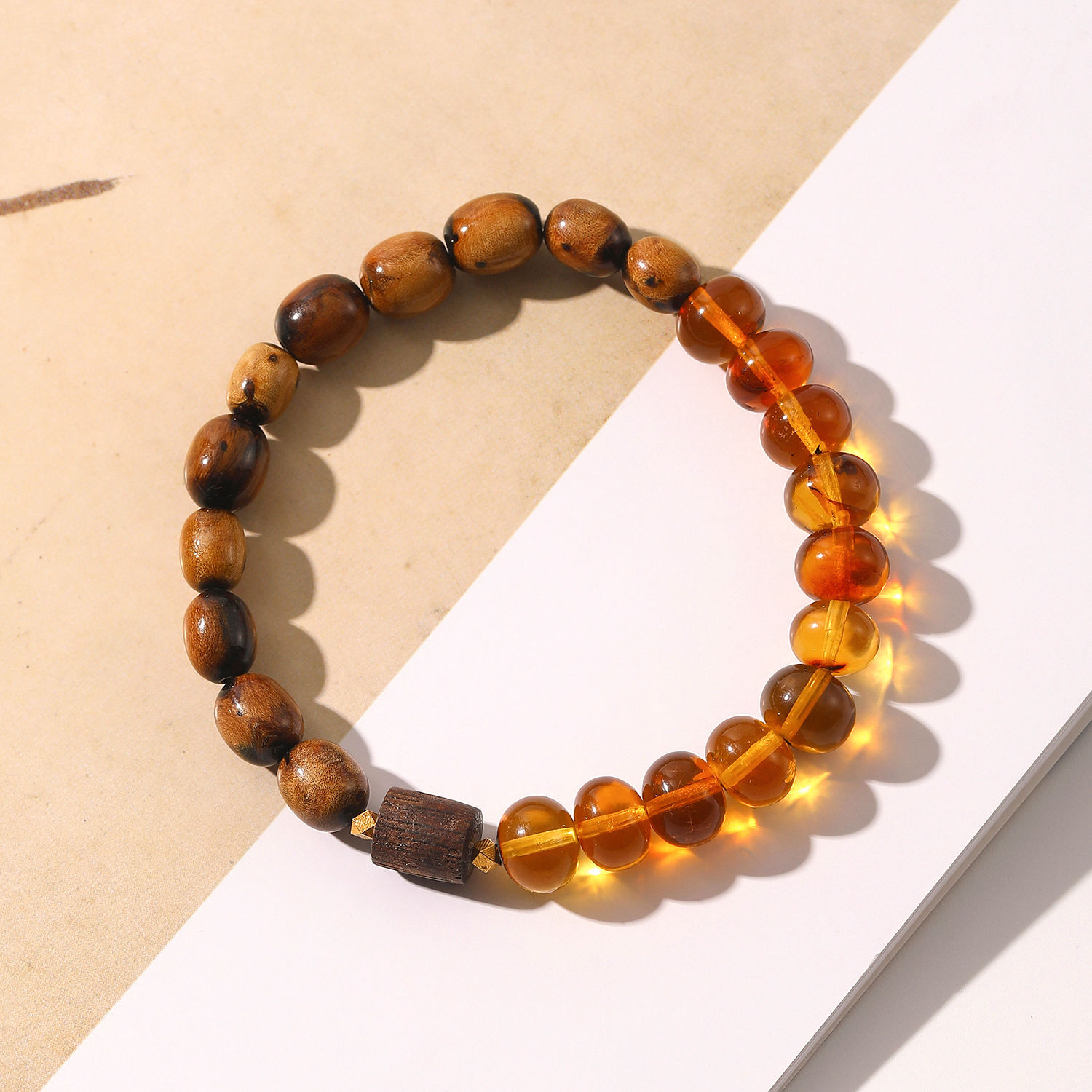 一了个卜【三七】18k金琥珀豆油黄设计款手链